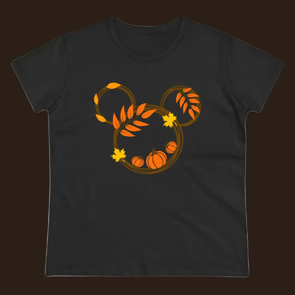 Mickey autumn leaves and pumpkins graphic with branches and pumpkins.