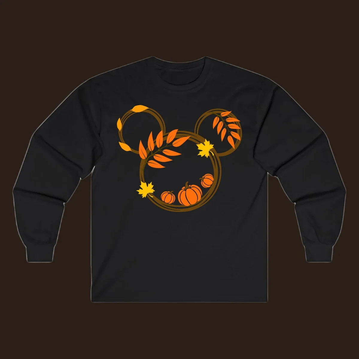 Mickey autumn leaves and pumpkins graphic with branches and pumpkins.