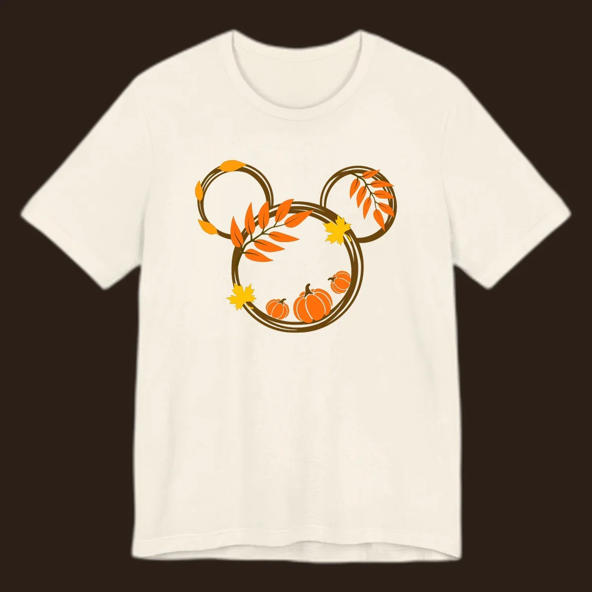 Mickey autumn leaves and pumpkins graphic with branches and pumpkins.