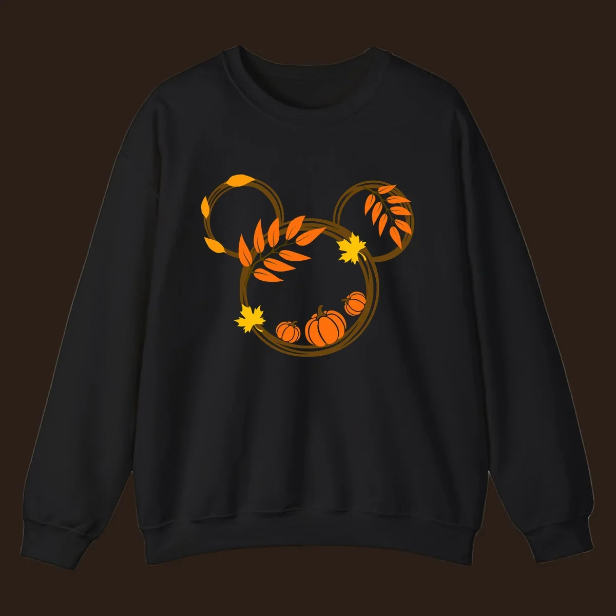 Mickey autumn leaves and pumpkins graphic with branches and pumpkins.