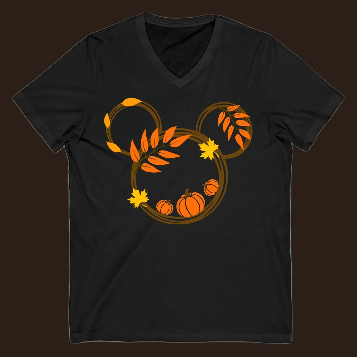 Mickey autumn leaves and pumpkins graphic with branches and pumpkins.