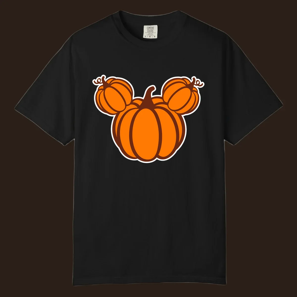 Mickey pumpkin head graphic with orange pumpkins and brown outlines.