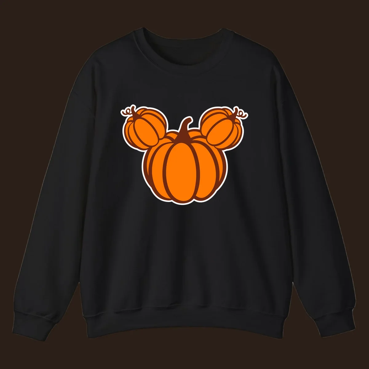 Mickey pumpkin head graphic with orange pumpkins and brown outlines.