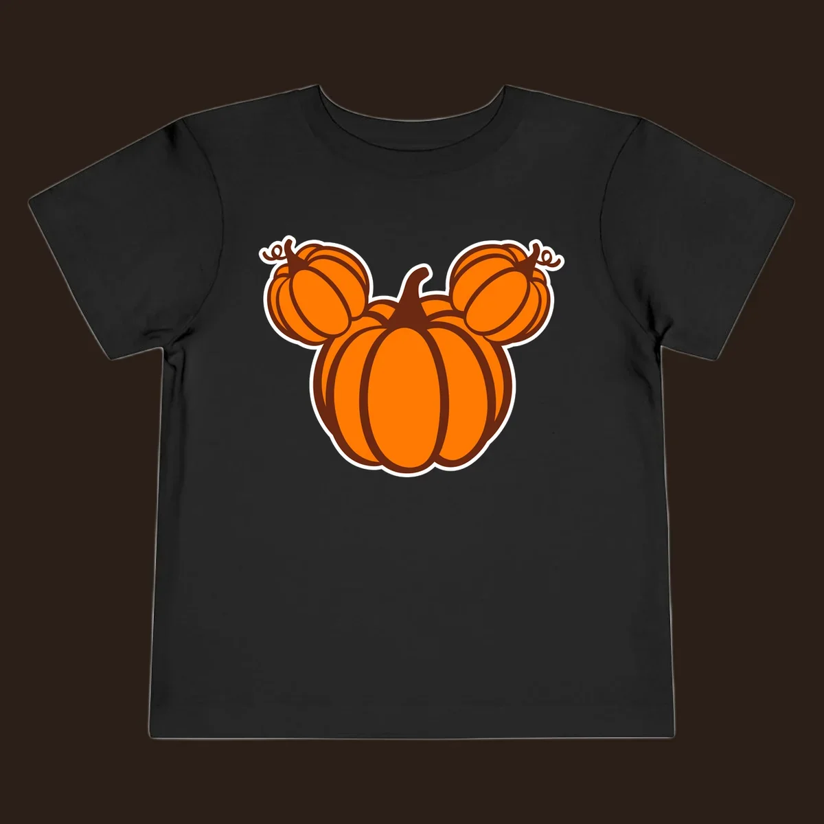 Mickey pumpkin head graphic with orange pumpkins and brown outlines.