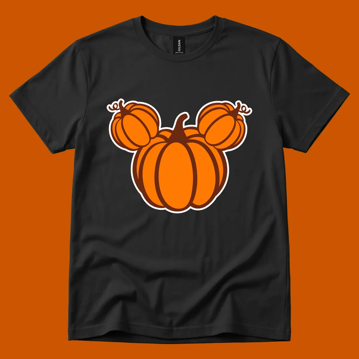 Mickey pumpkin head graphic with orange pumpkins and brown outlines.