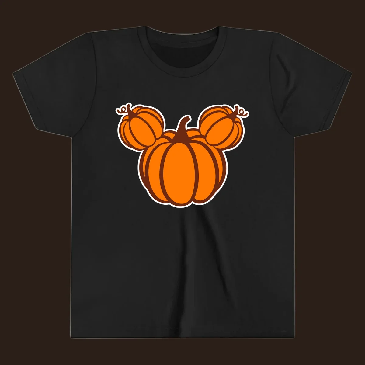 Mickey pumpkin head graphic with orange pumpkins and brown outlines.