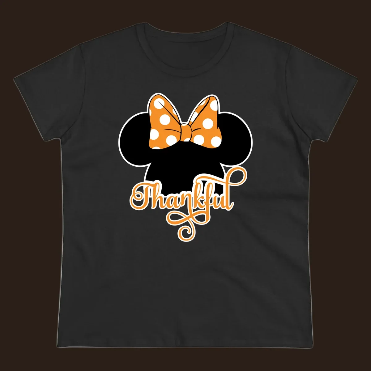 Minnie Mouse ears with orange polka dot bow and "Thankful" text, perfect for Thanksgiving.