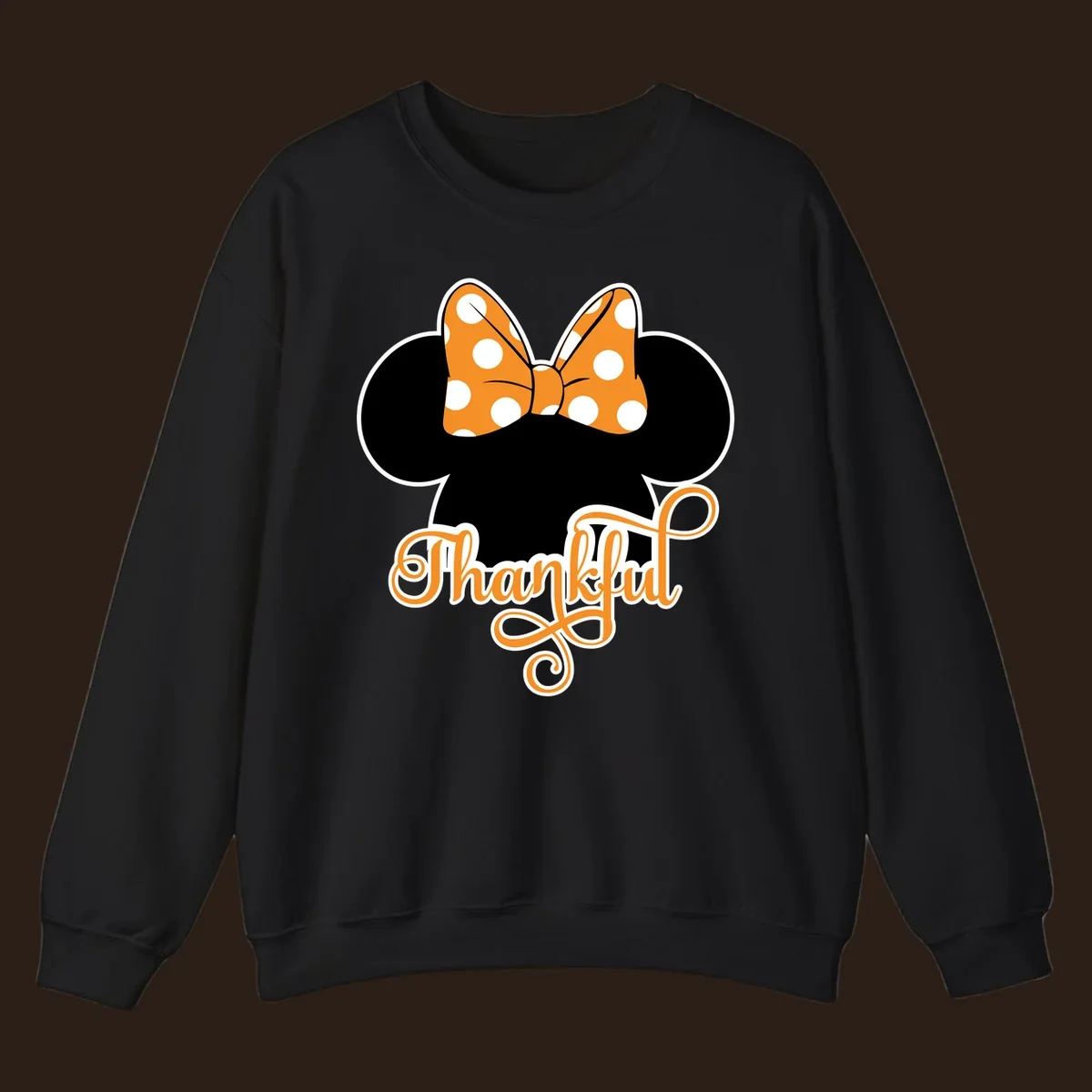 Minnie Mouse ears with orange polka dot bow and "Thankful" text, perfect for Thanksgiving.