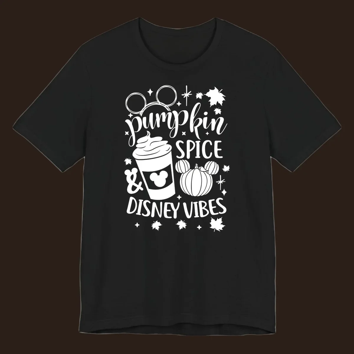 Pumpkin spice and Disney vibes text with Mickey ears, coffee cup, and pumpkin graphic. Pumpkin-spice-disney.