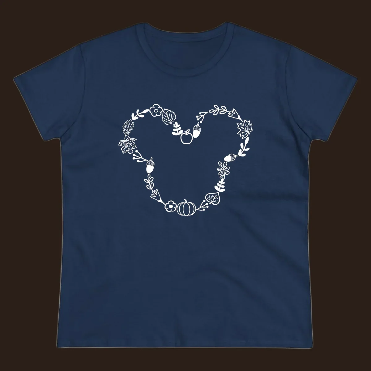 Heart shaped autumn wreath with leaves, acorns, pumpkin, and flowers. Outline design.