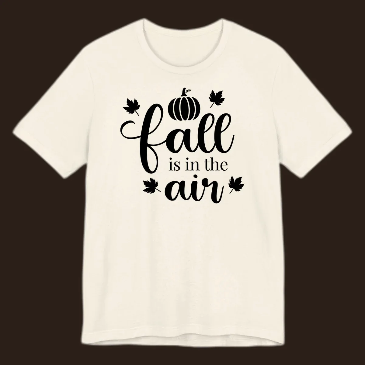 Fall is in the air phrase with pumpkin and maple leaves graphic.