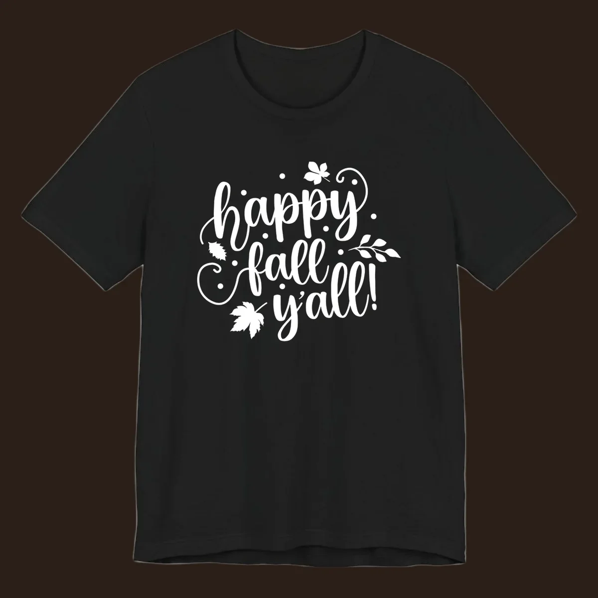 Happy Fall Y'all script design with maple leaves and swirls.