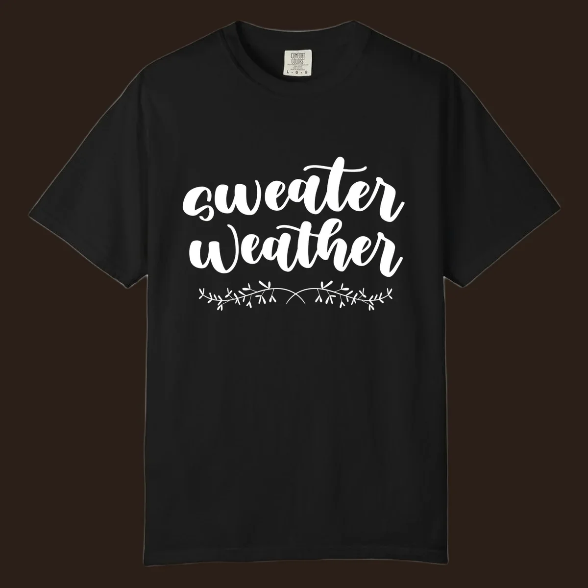 Sweater Weather text in white script font with leafy vine accent.