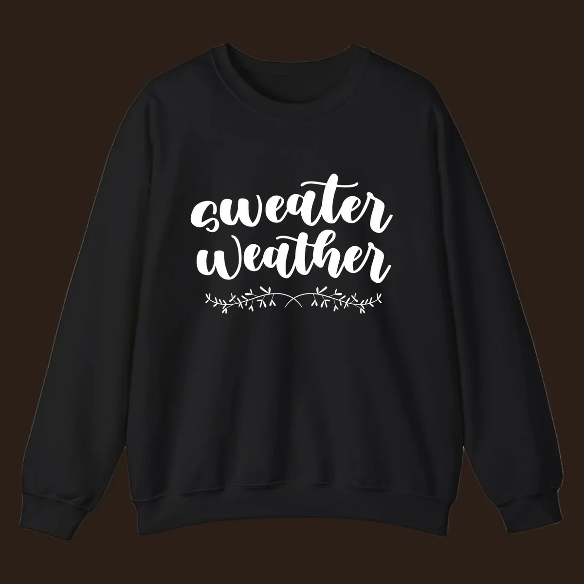 Sweater Weather text in white script font with leafy vine accent.