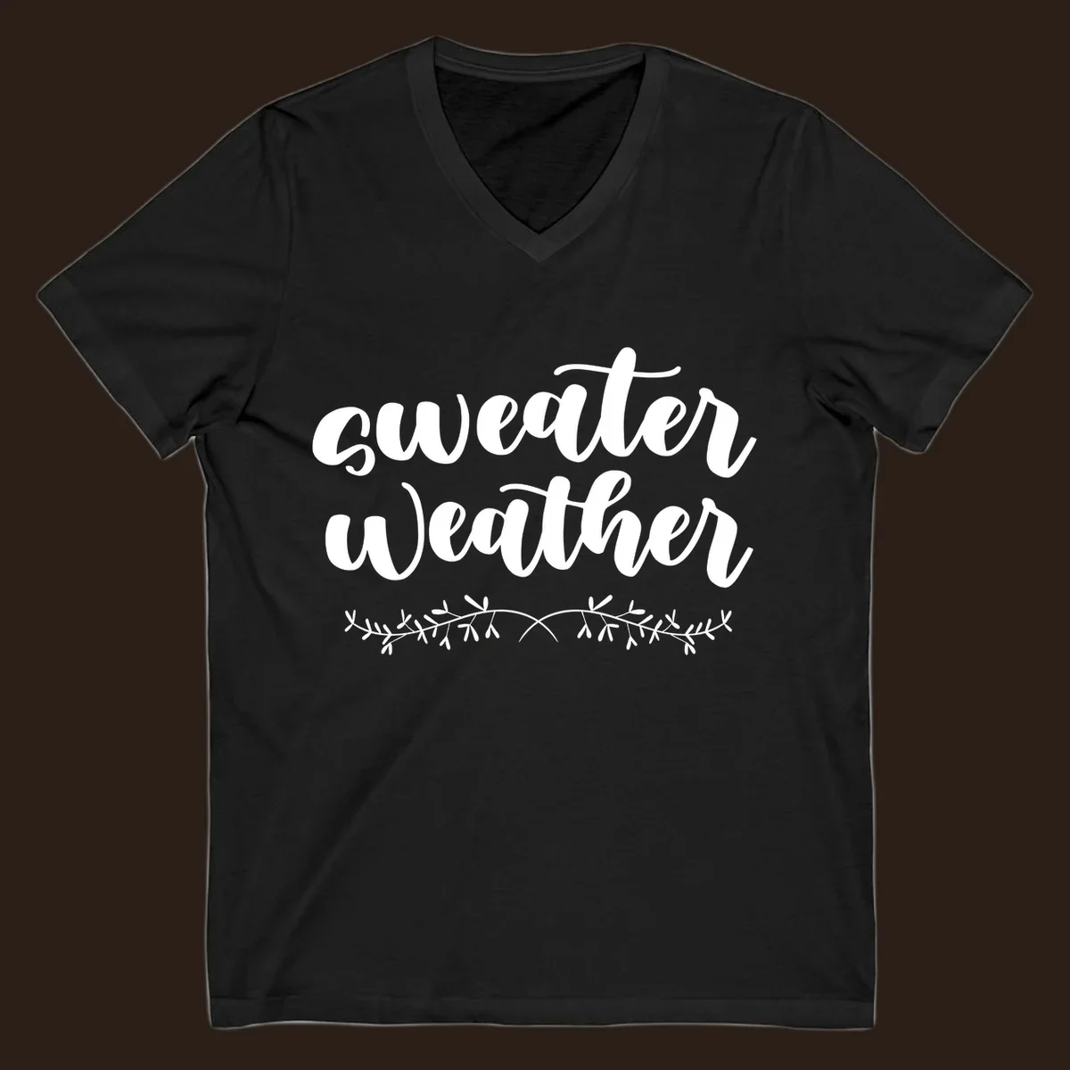 Sweater Weather text in white script font with leafy vine accent.