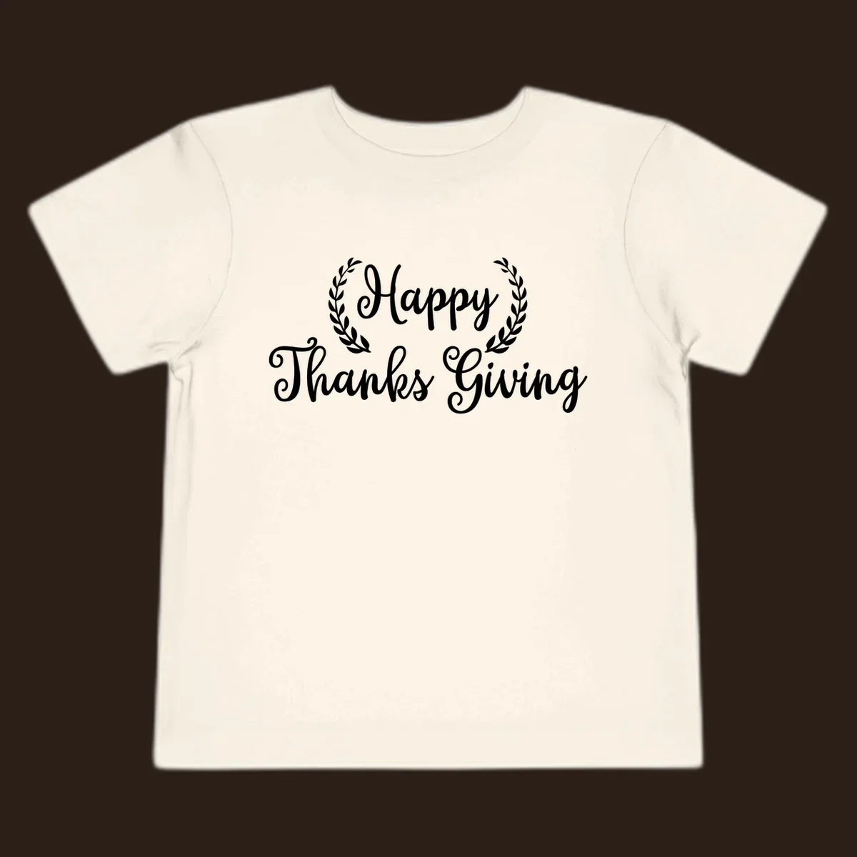 Happy Thanksgiving text with a laurel wreath, in white on black and black on white.
