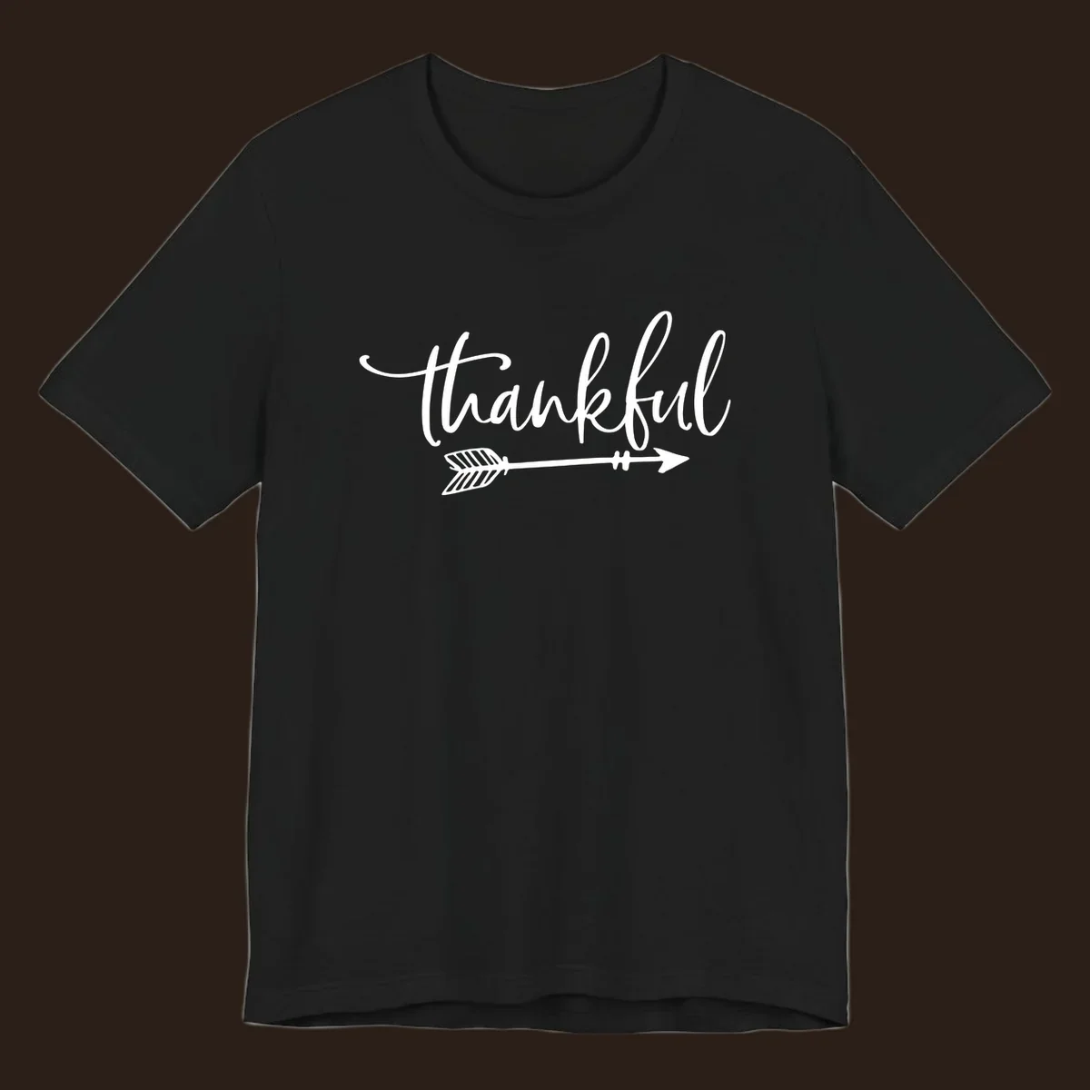 Thankful text with an arrow graphic, Thanksgiving theme.