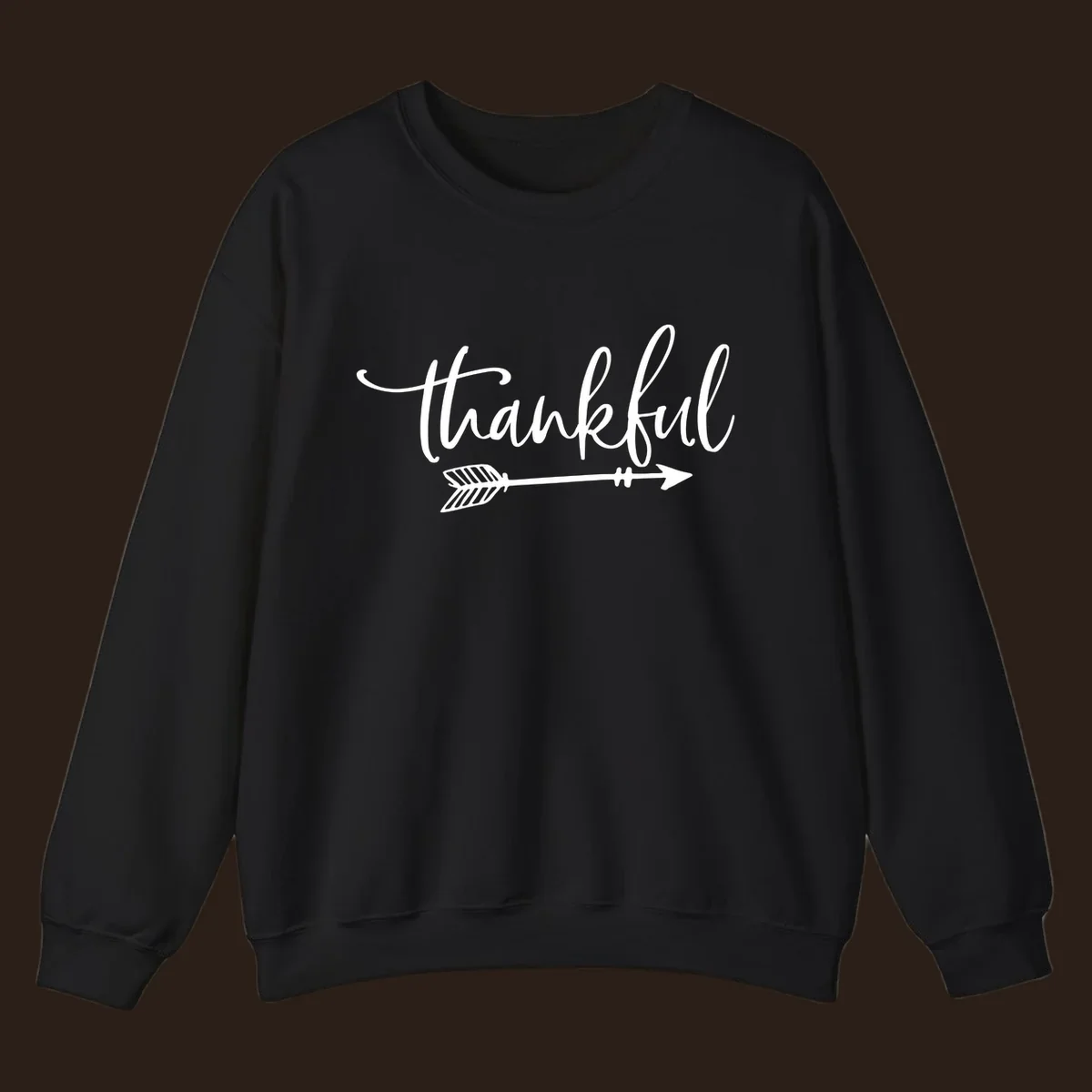 Thankful text with an arrow graphic, Thanksgiving theme.