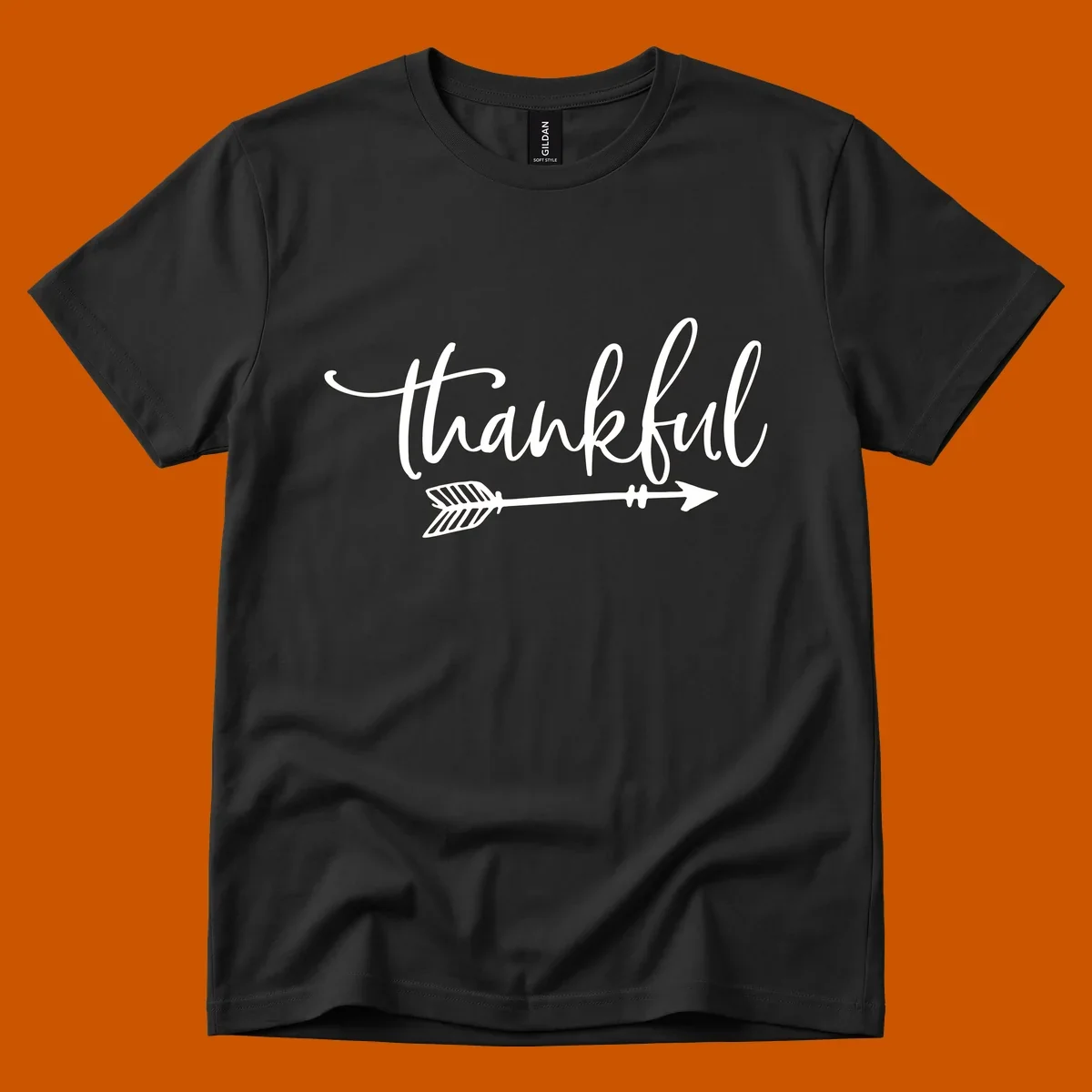 Thankful text with an arrow graphic, Thanksgiving theme.