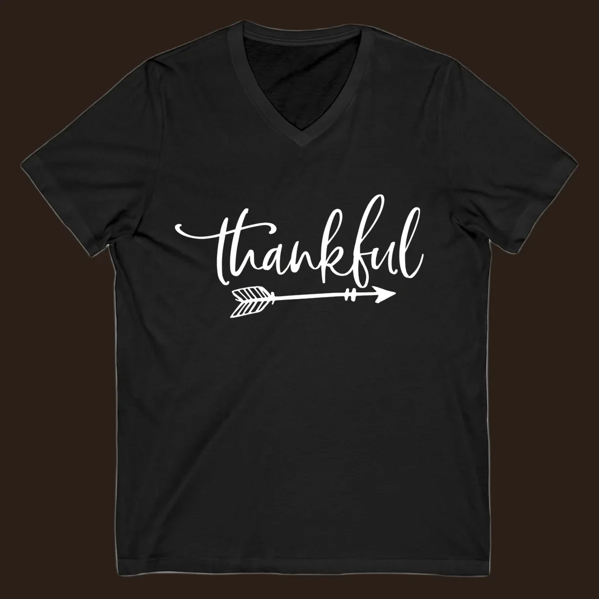 Thankful text with an arrow graphic, Thanksgiving theme.