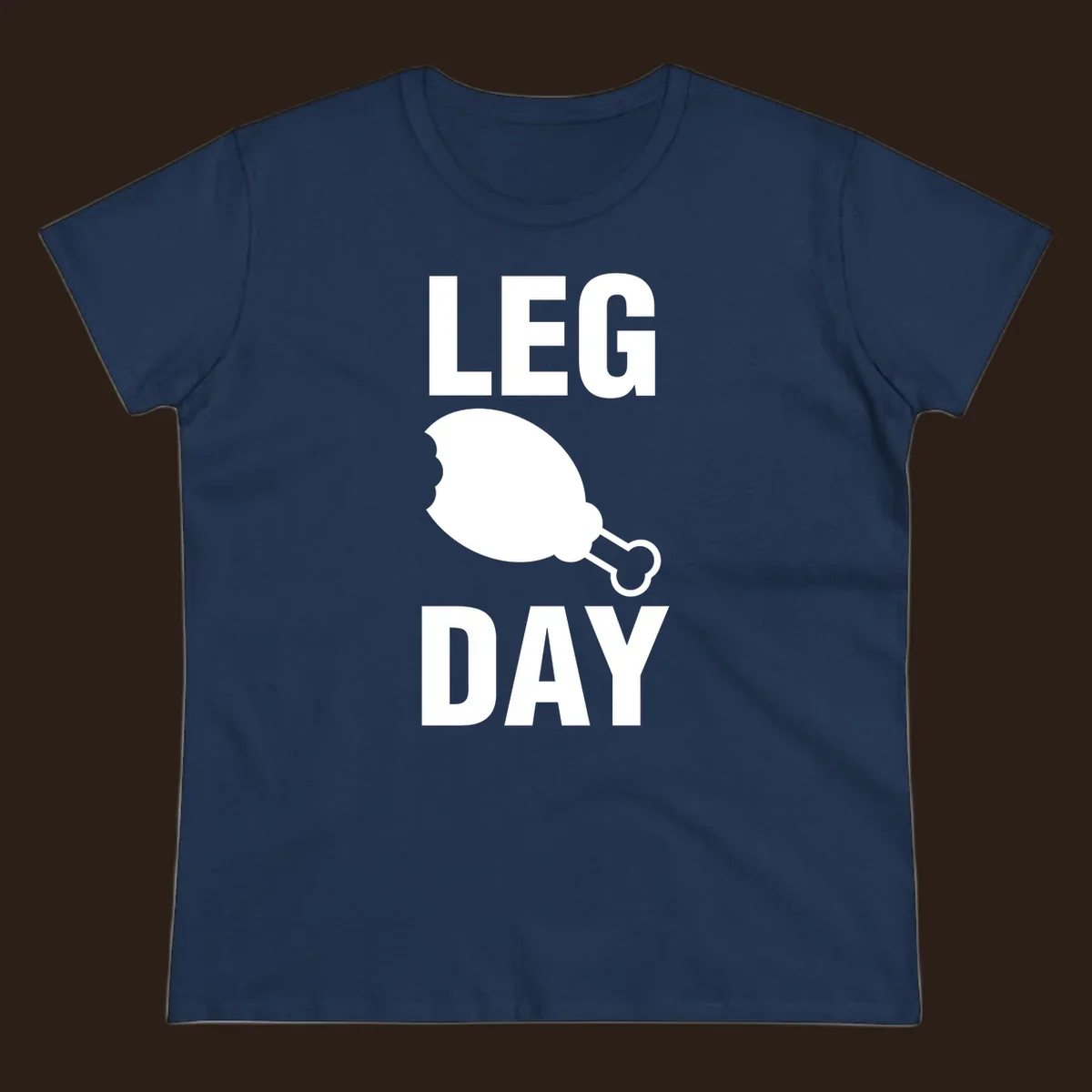 Leg Day text with a bitten chicken leg graphic. Humor fitness design.