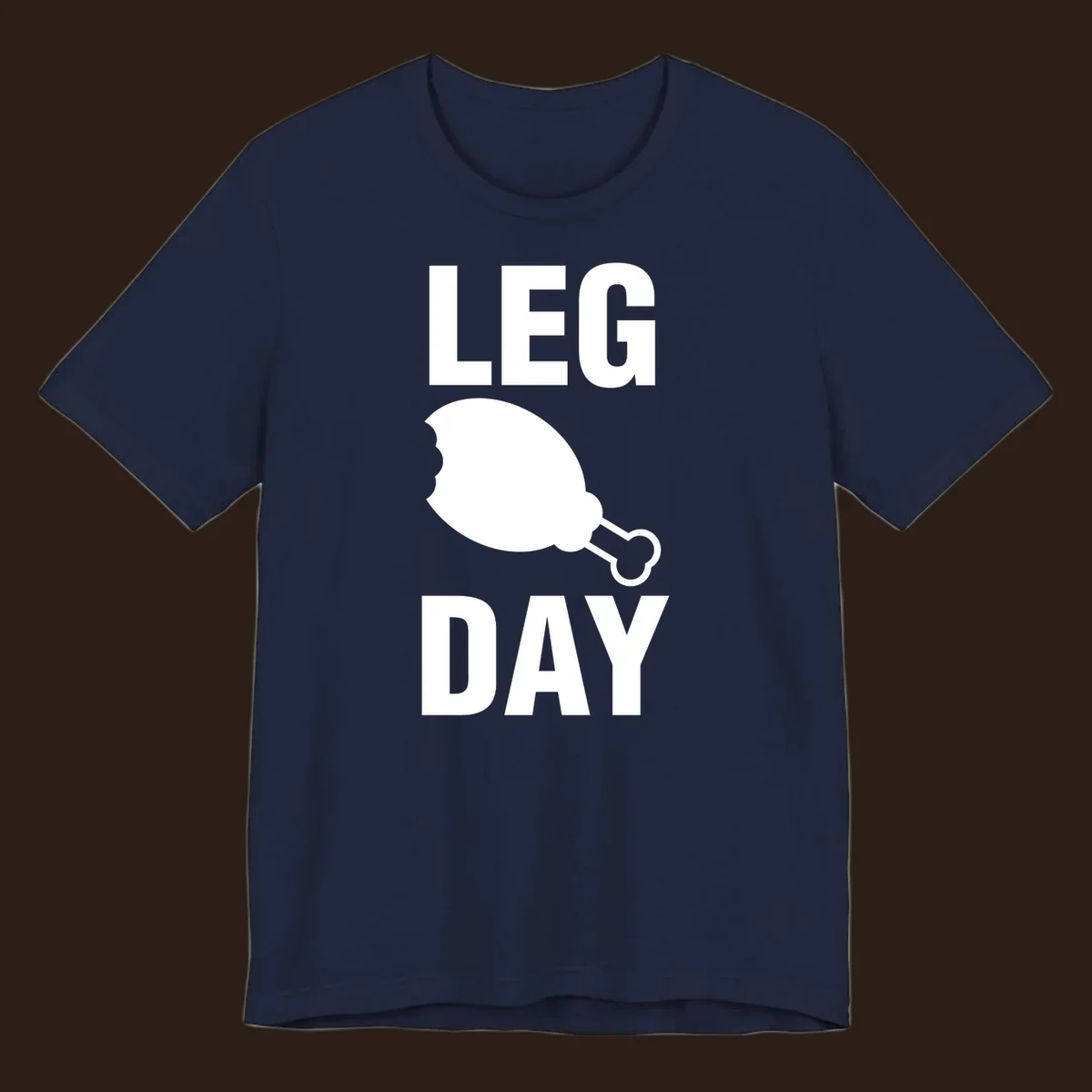 Leg Day text with a bitten chicken leg graphic. Humor fitness design.