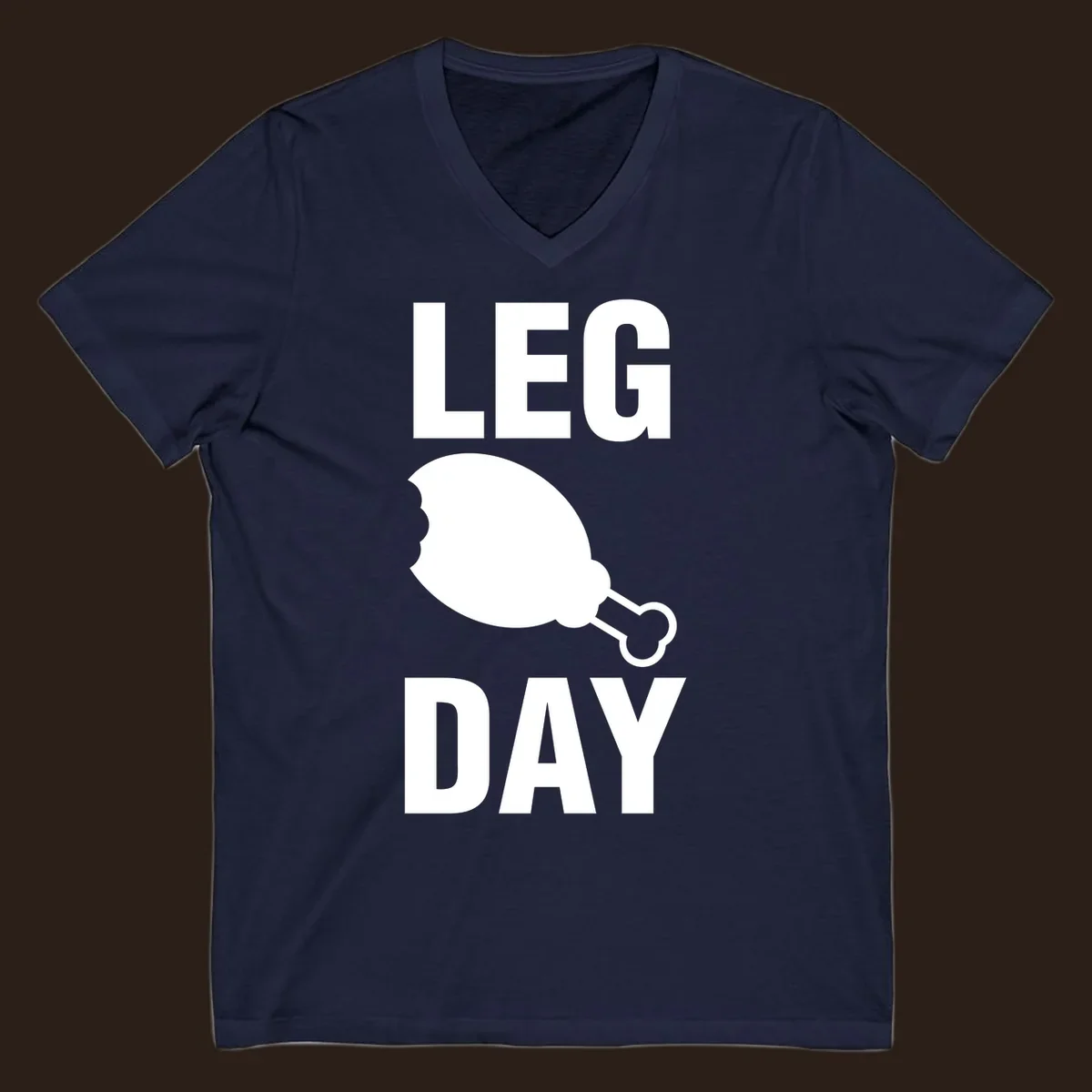 Leg Day text with a bitten chicken leg graphic. Humor fitness design.