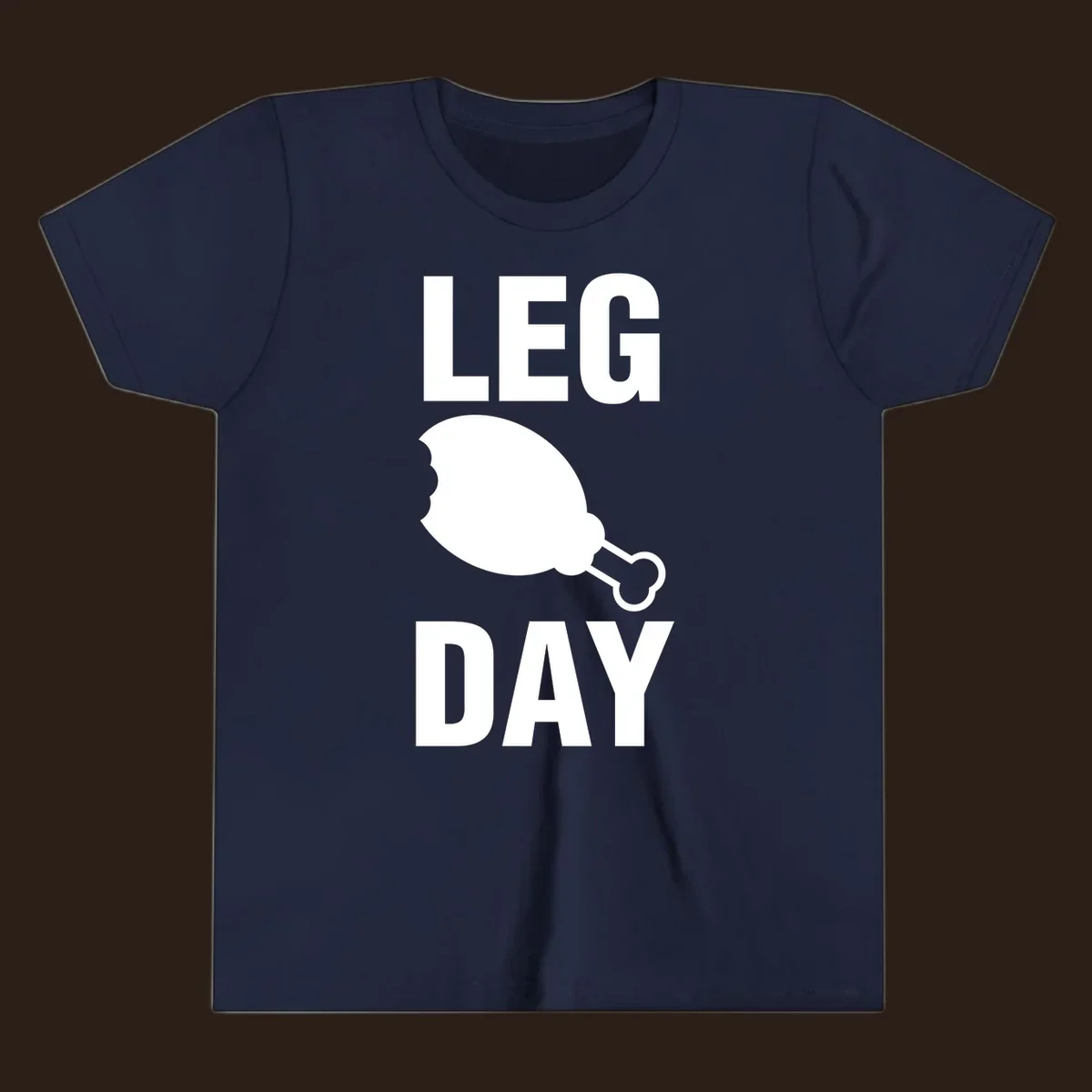 Leg Day text with a bitten chicken leg graphic. Humor fitness design.