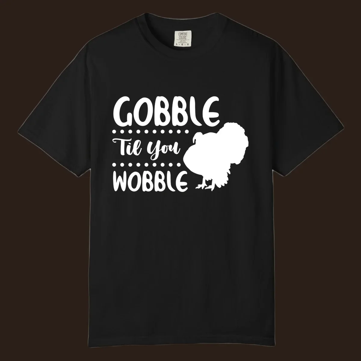 Gobble til you wobble turkey design with text and a turkey silhouette.
