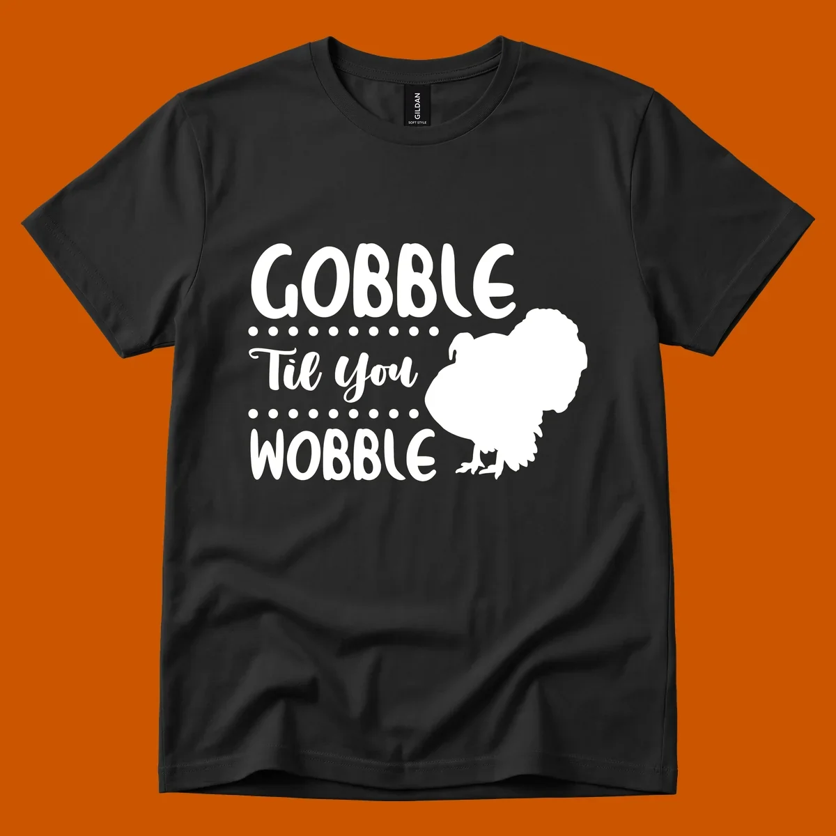 Gobble til you wobble turkey design with text and a turkey silhouette.