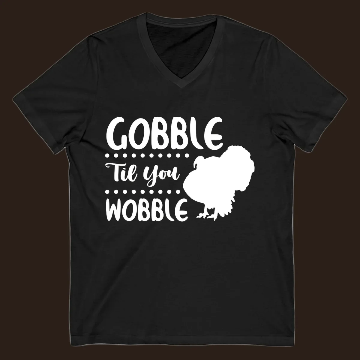 Gobble til you wobble turkey design with text and a turkey silhouette.