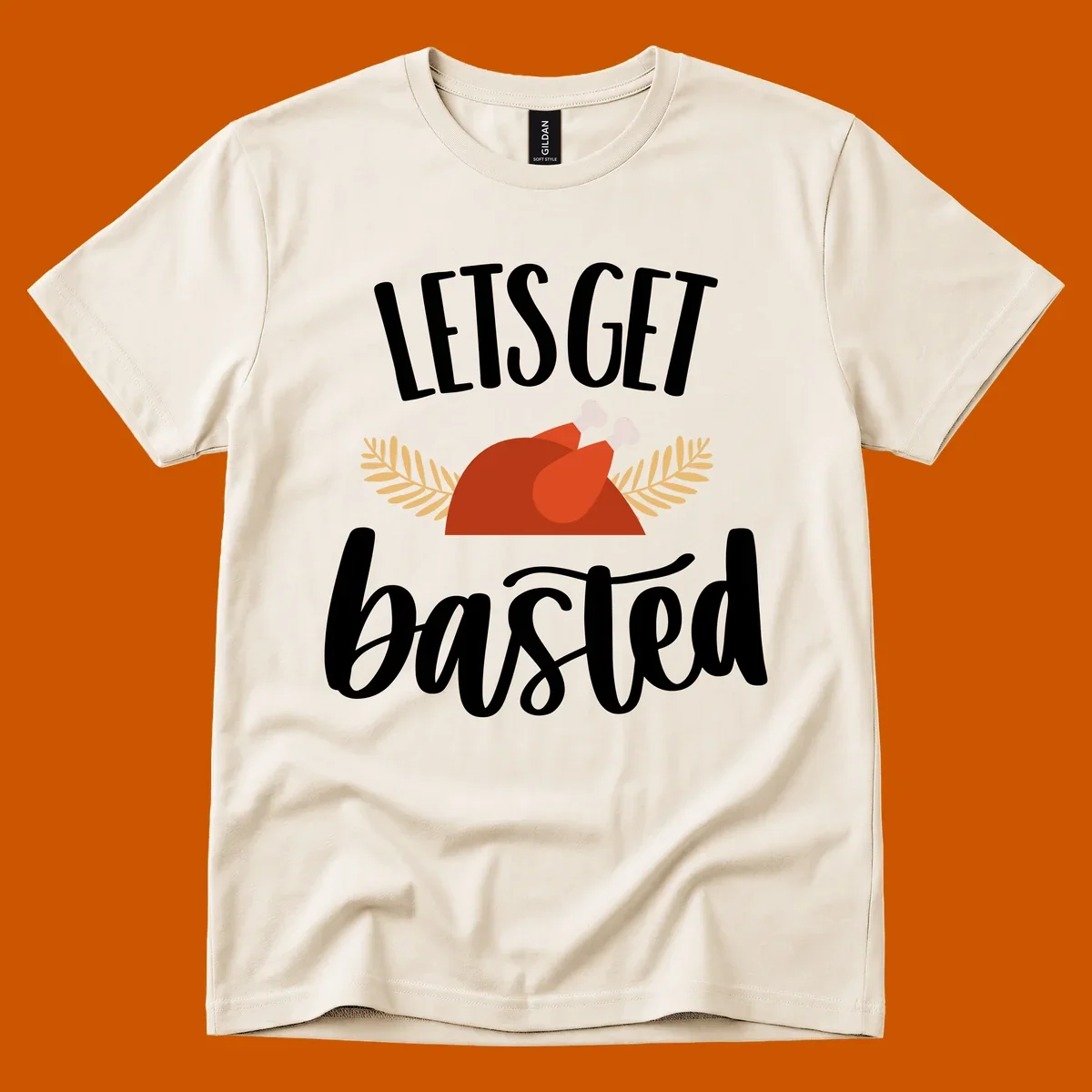 Lets Get Basted Thanksgiving Turkey design with playful text and a roasted turkey illustration.