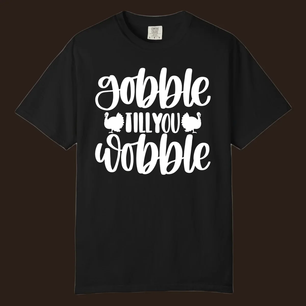 Gobble till you wobble text with turkey illustrations, Thanksgiving design.
