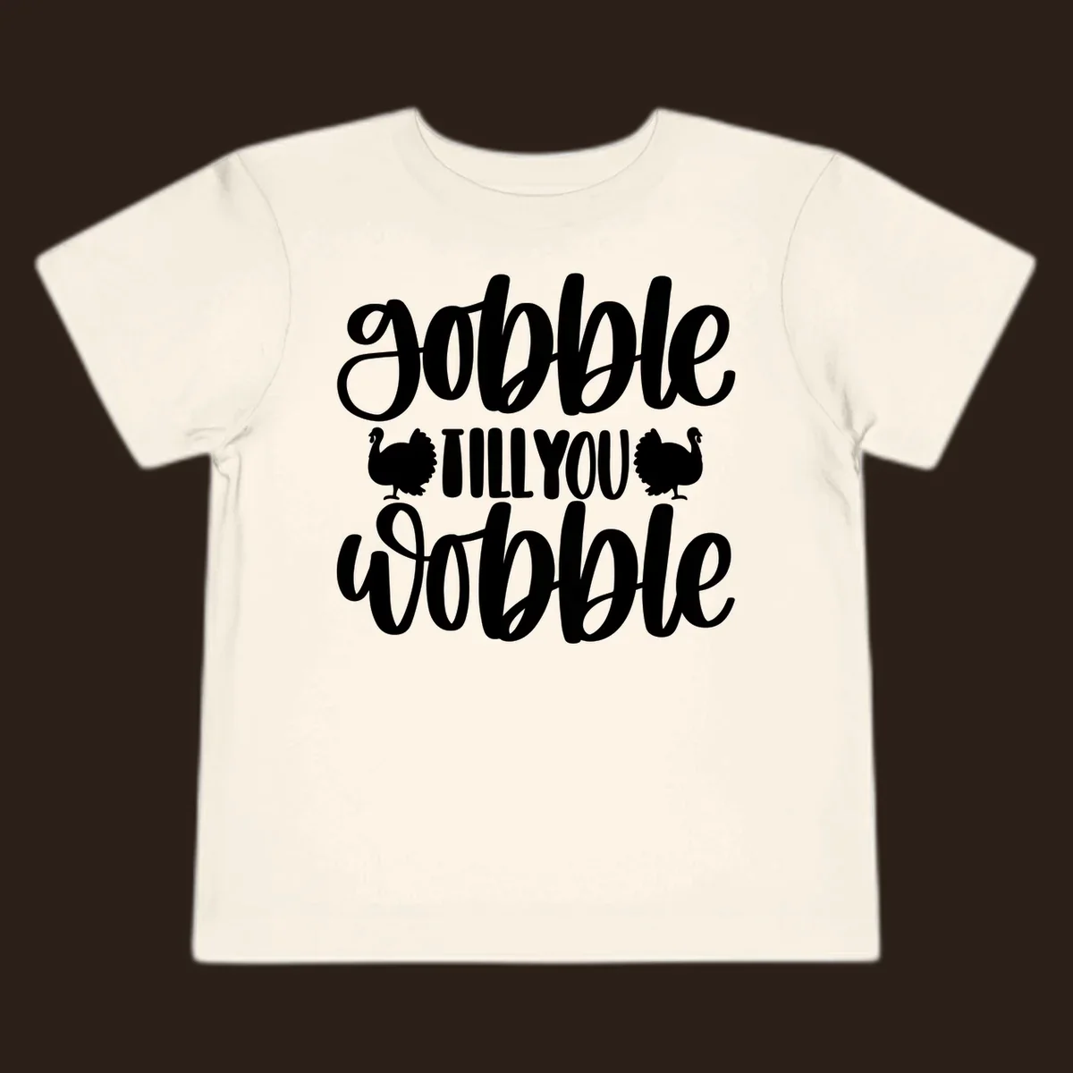 Gobble till you wobble text with turkey illustrations, Thanksgiving design.