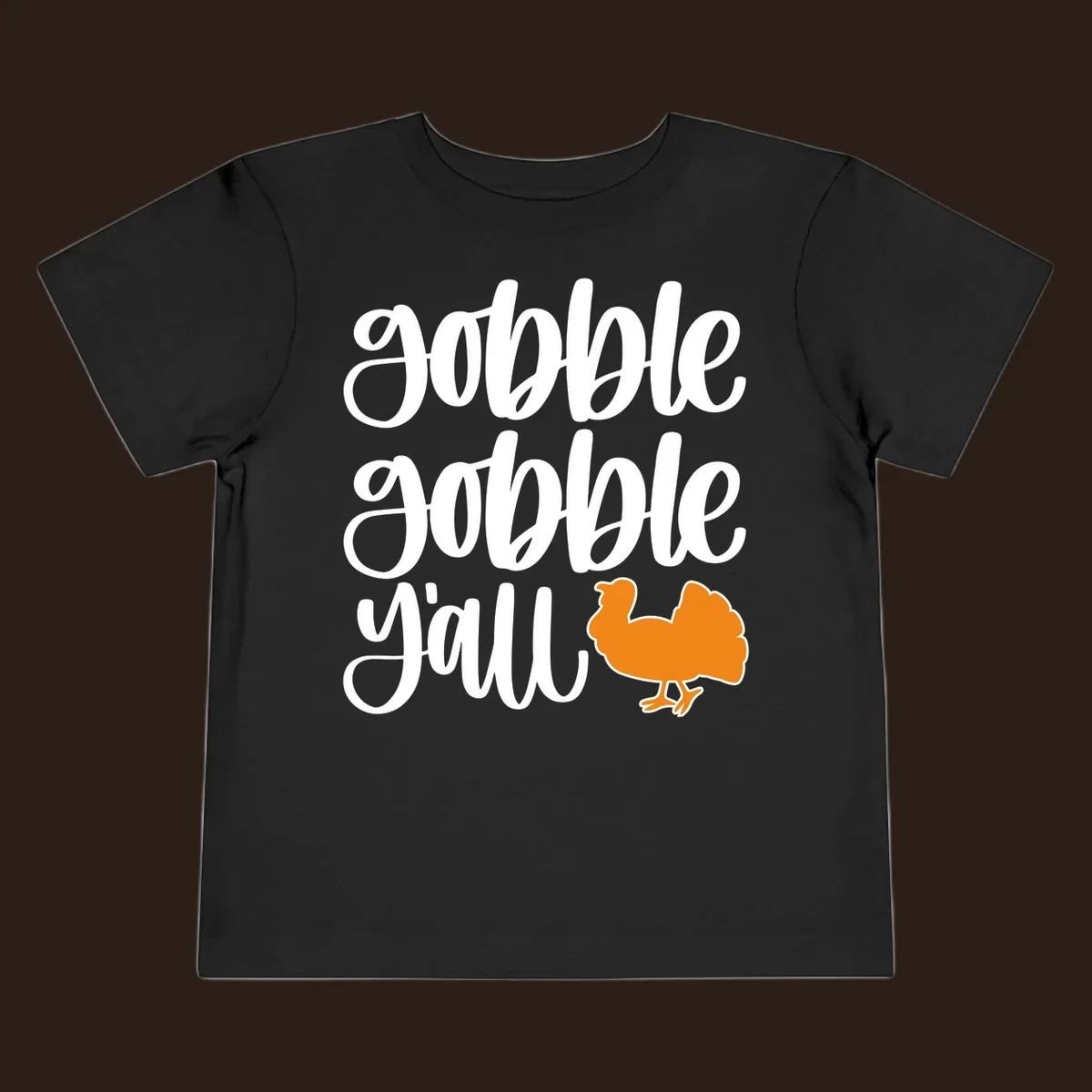 Gobble gobble y'all text with a turkey illustration, gobble-gobble-turkey Thanksgiving design.