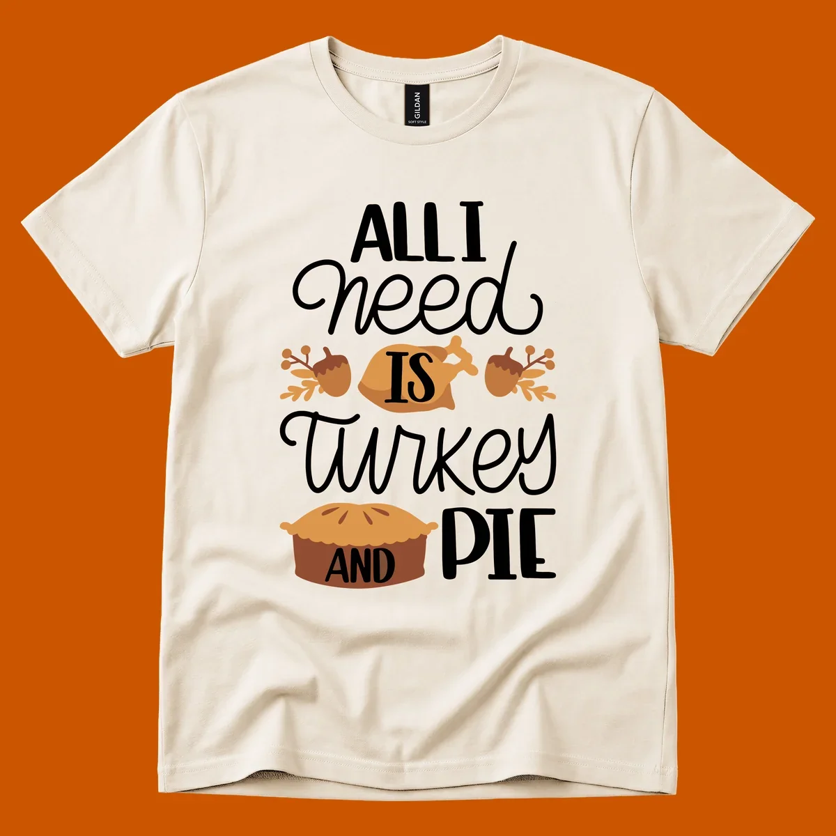 Typography design with illustrations of turkey, pie, and acorns, saying 'ALL I NEED IS TURKEY AND PIE'.