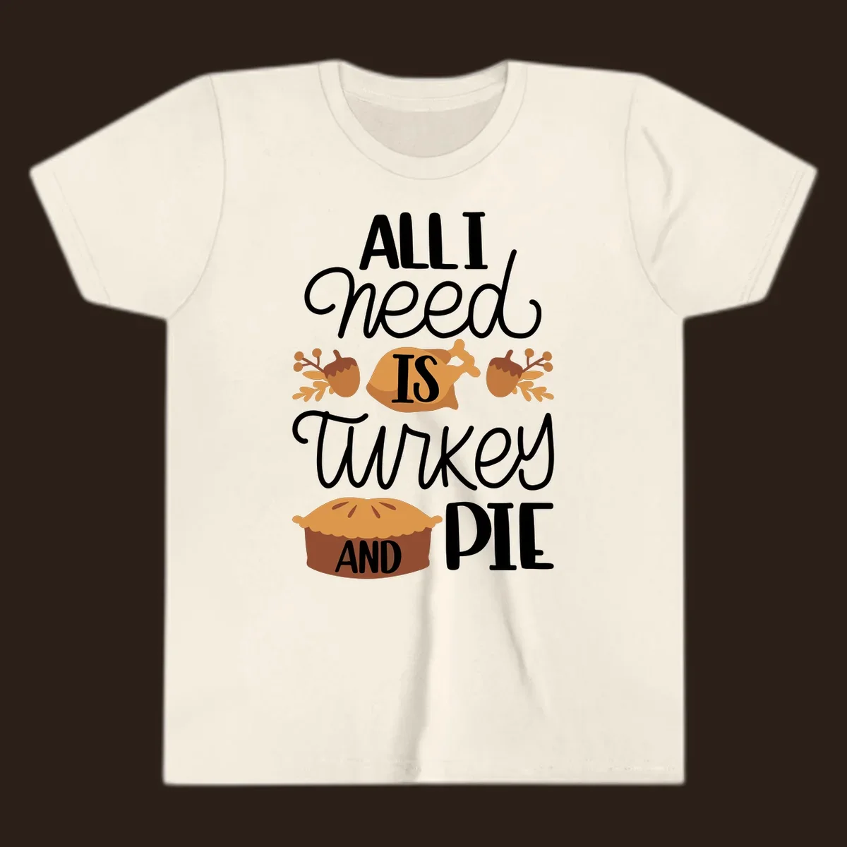 Typography design with illustrations of turkey, pie, and acorns, saying 'ALL I NEED IS TURKEY AND PIE'.