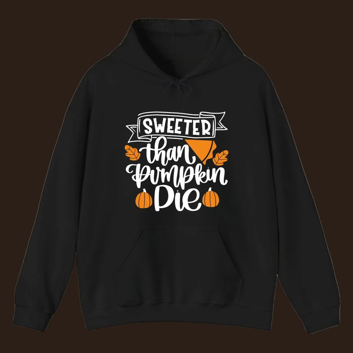 Sweeter than pumpkin pie thanksgiving design with text, pie slice, leaves, and pumpkins.