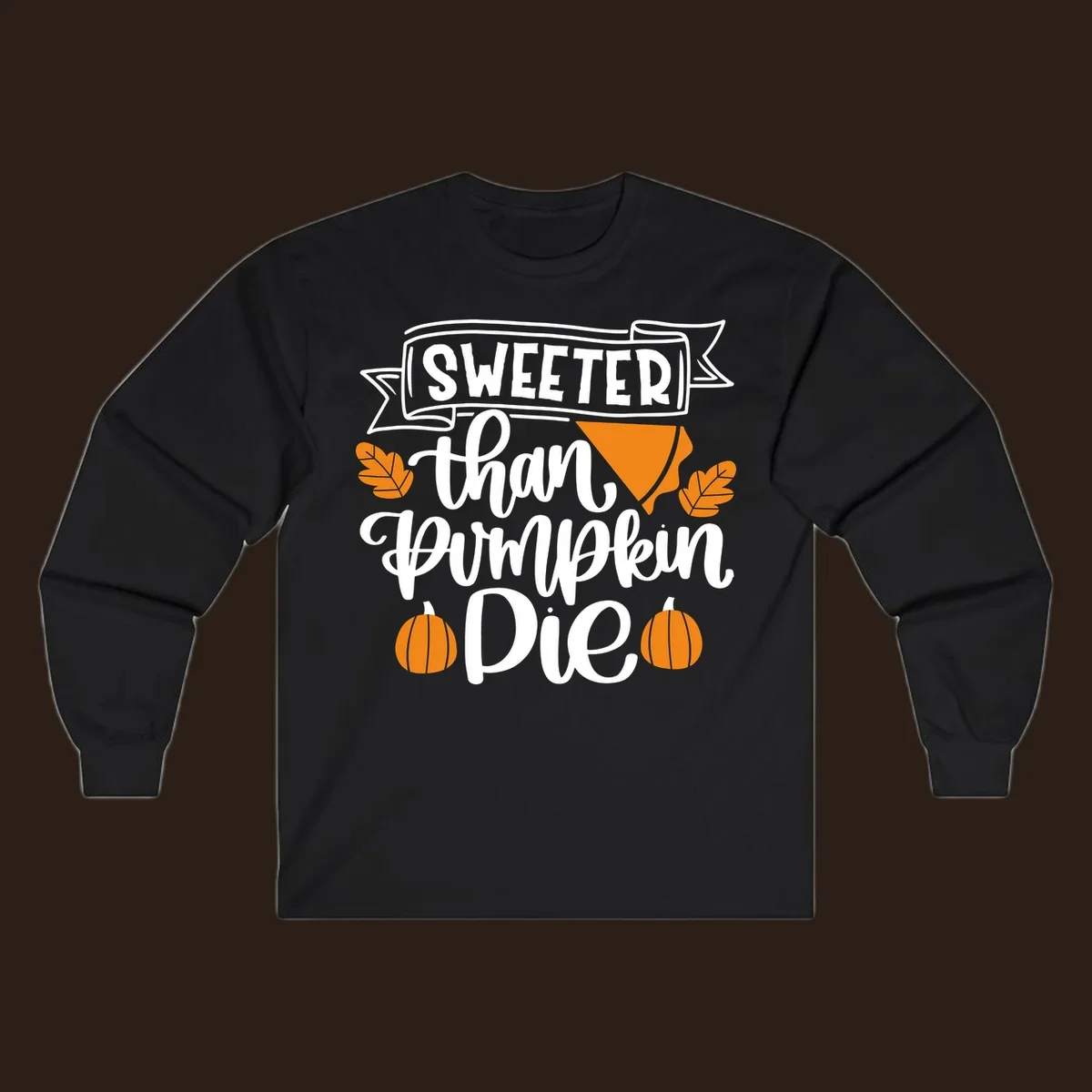 Sweeter than pumpkin pie thanksgiving design with text, pie slice, leaves, and pumpkins.