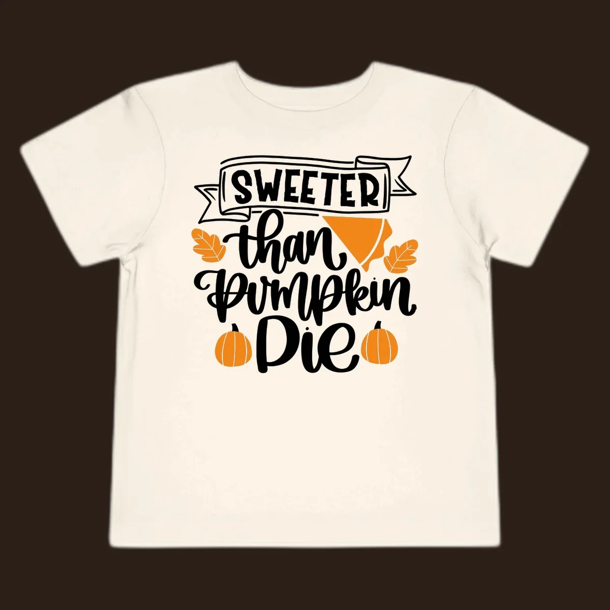 Sweeter than pumpkin pie thanksgiving design with text, pie slice, leaves, and pumpkins.