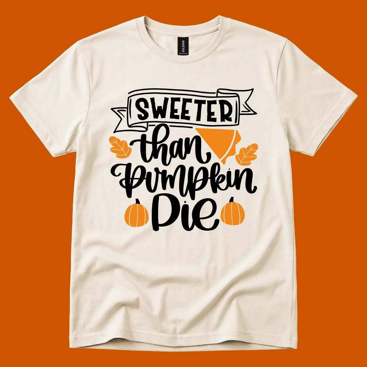 Sweeter than pumpkin pie thanksgiving design with text, pie slice, leaves, and pumpkins.