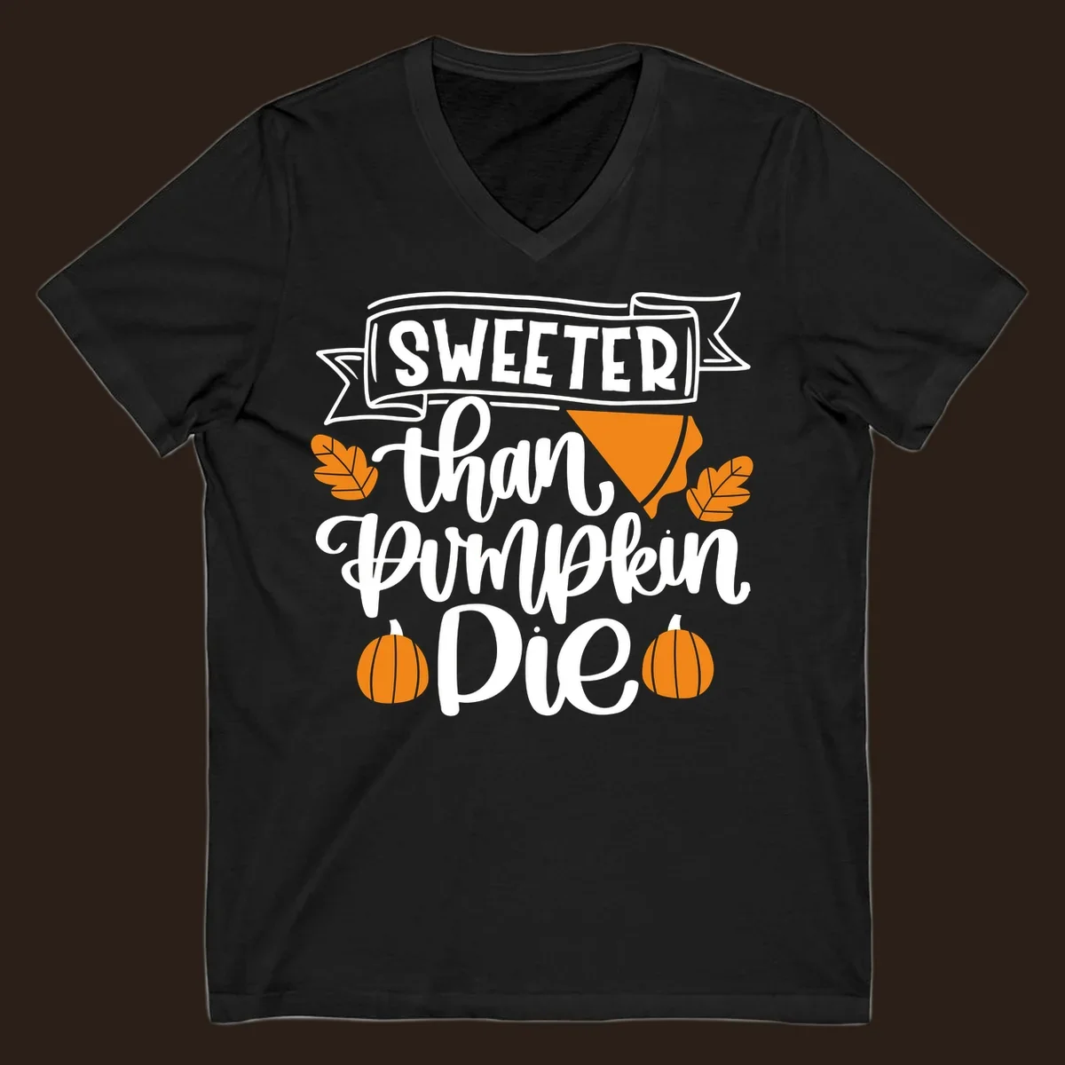 Sweeter than pumpkin pie thanksgiving design with text, pie slice, leaves, and pumpkins.