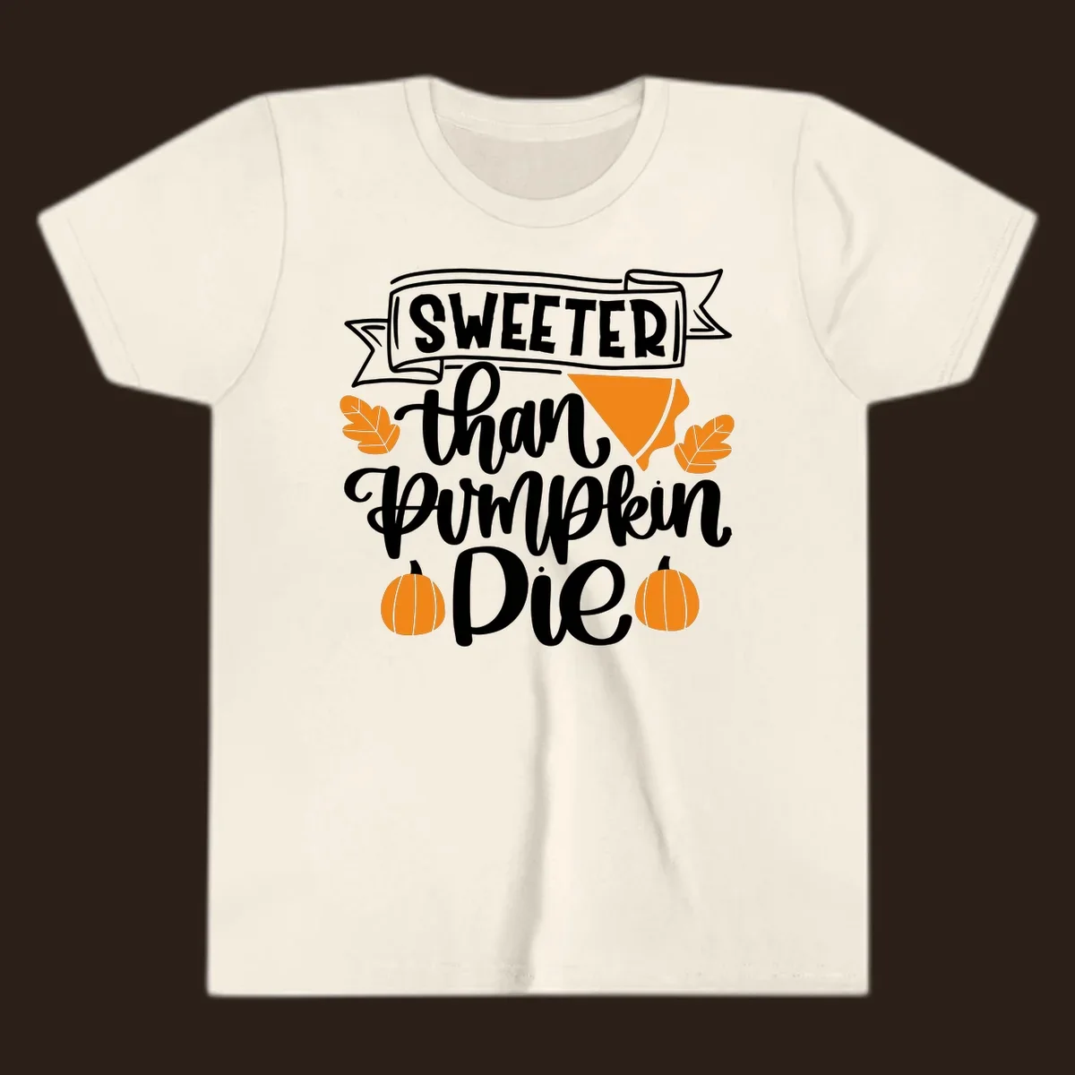 Sweeter than pumpkin pie thanksgiving design with text, pie slice, leaves, and pumpkins.