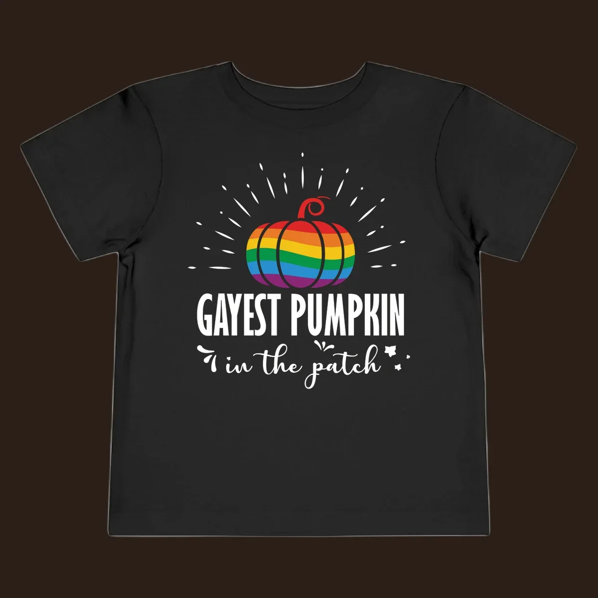 Gayest pumpkin in the patch design with rainbow pumpkin and text.