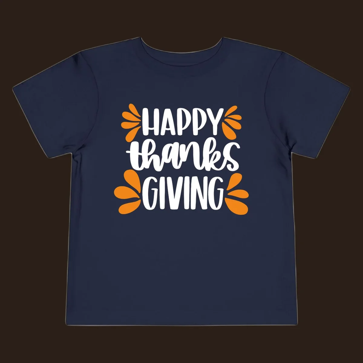 Happy Thanksgiving text with orange leaf accents, typography design.