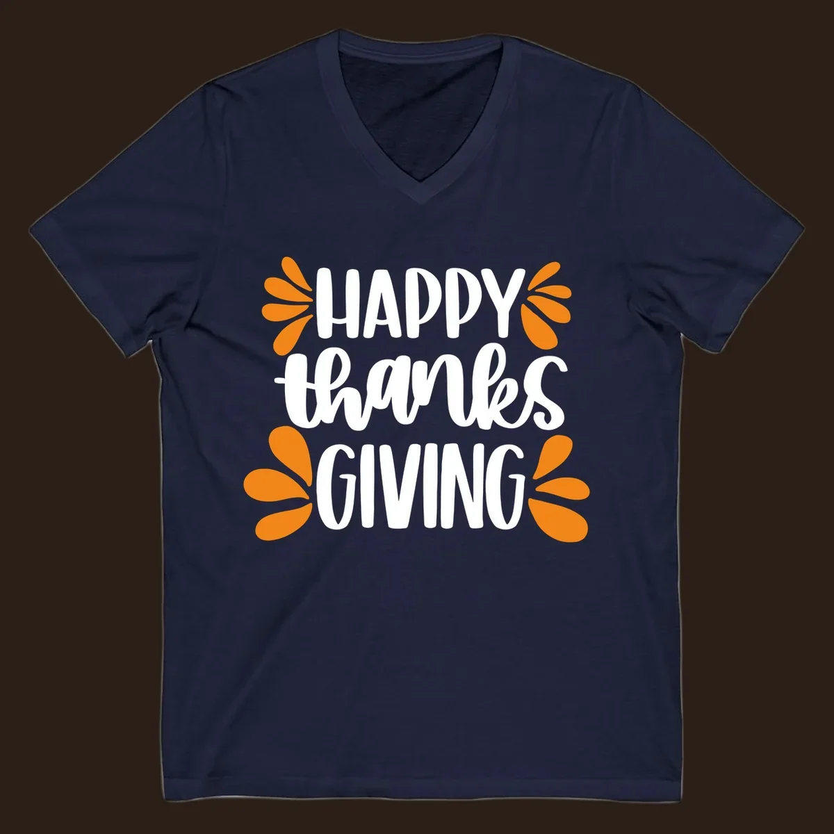 Happy Thanksgiving text with orange leaf accents, typography design.