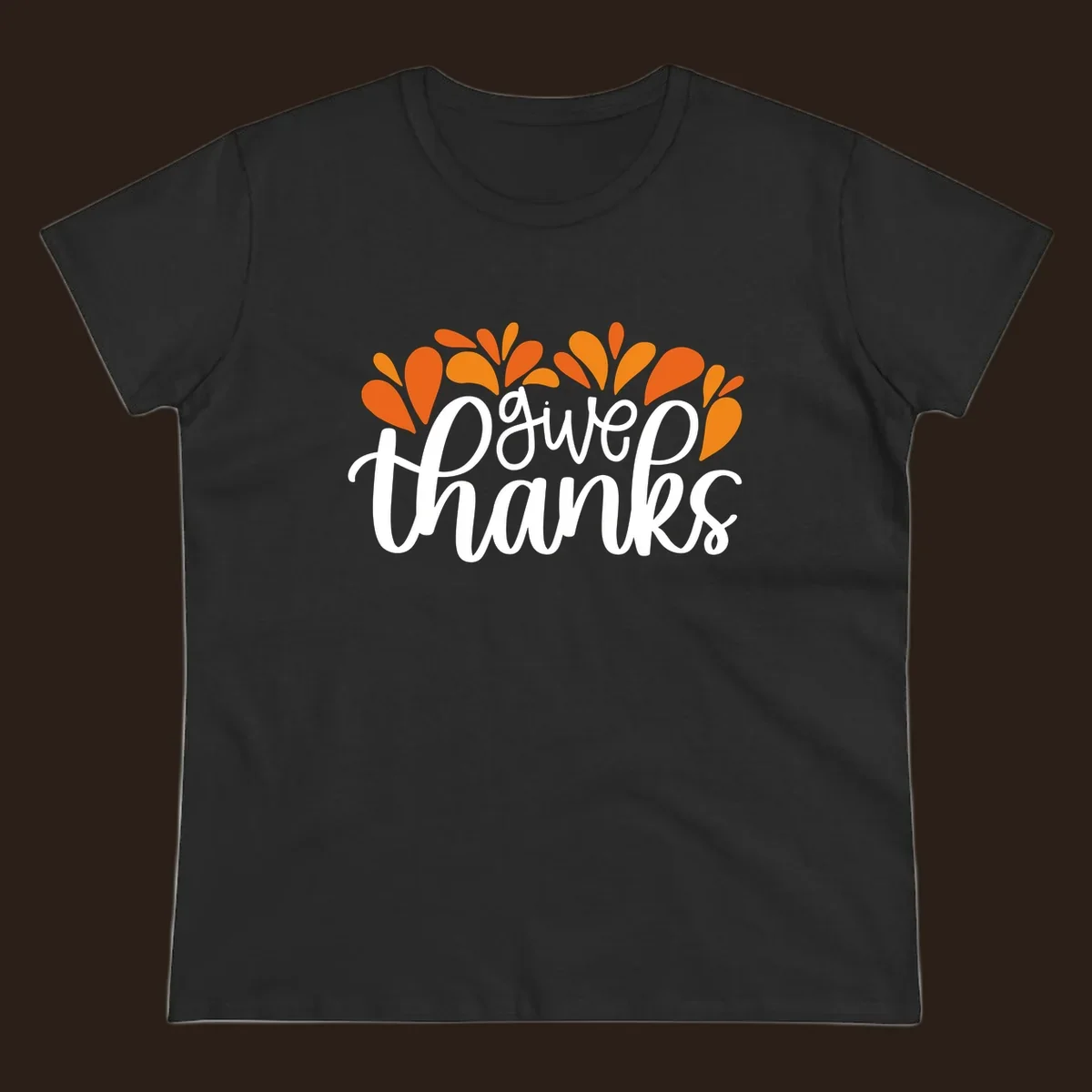 give thanks leaves design with white script text and orange leaf shapes