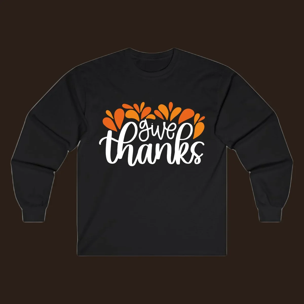 give thanks leaves design with white script text and orange leaf shapes