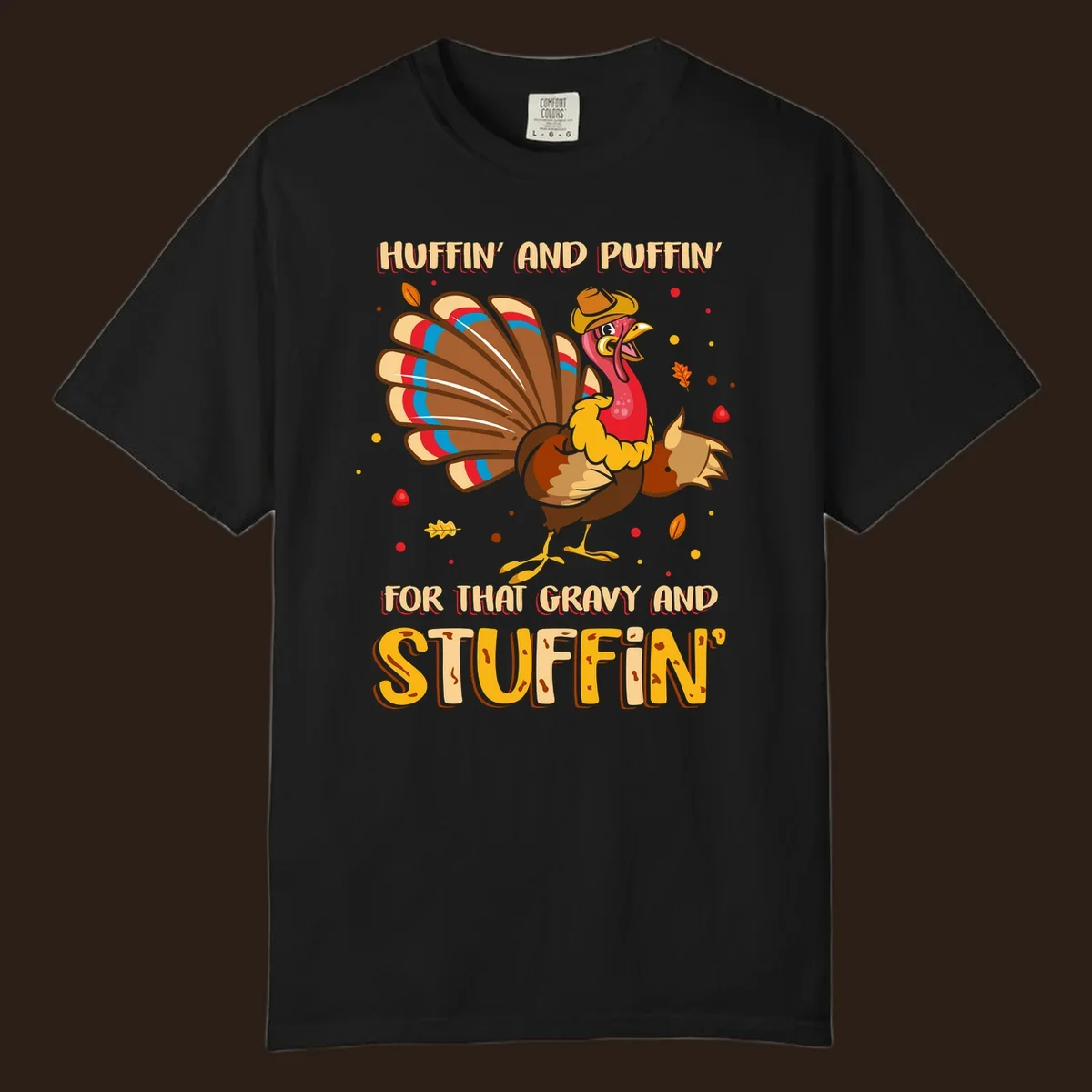 Cartoon turkey with fanned feathers and text 'Huffin And Puffin For Gravy Stuffin'