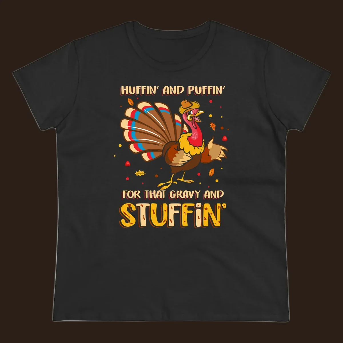 Cartoon turkey with fanned feathers and text 'Huffin And Puffin For Gravy Stuffin'